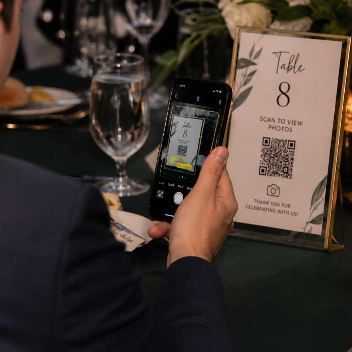 Guest scanning a QR code to open the event album